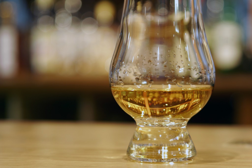 Glass of Whiskey on bar at Edinburgh's Scotch Whiskey Heritage Centre