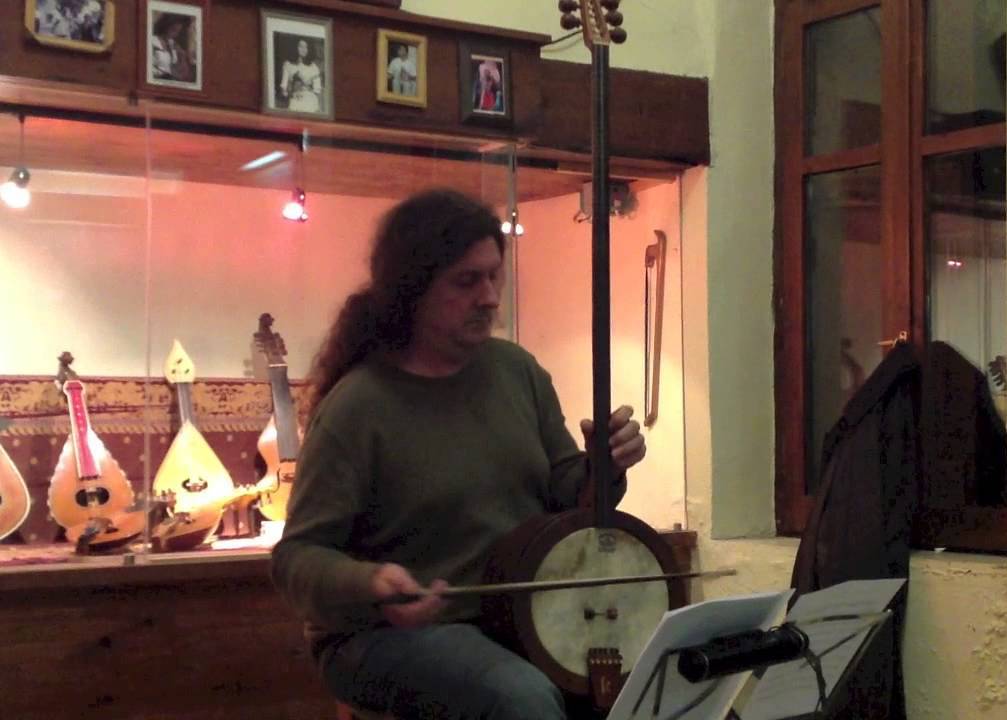 Multi-instrumentalist Evgenios Voulgaris here playing the yaylı tambur