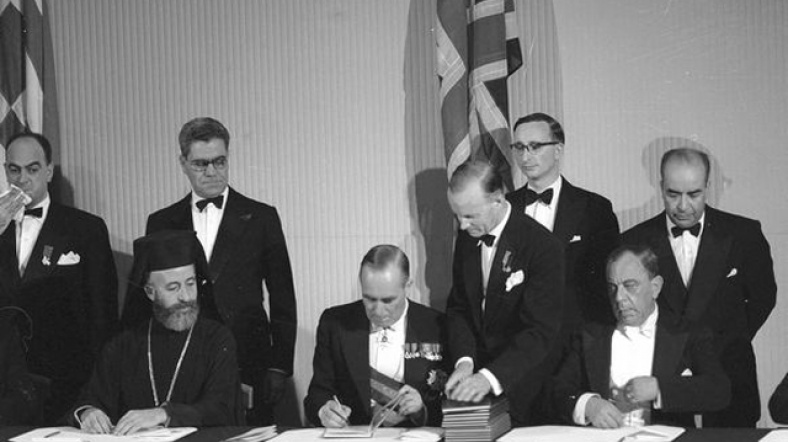 Archbishop Makarios (centre) and Sir Hugh Foot (right) for the UK, signing the Treaty of the Establishment of the Republic of Cyprus in 1960