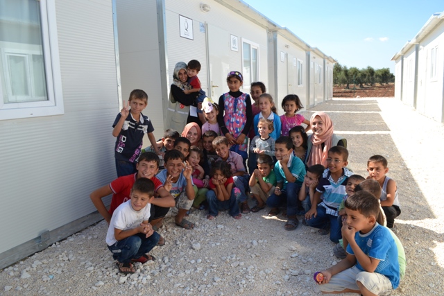 Syrian children receiving education in a Turkish refugee camp