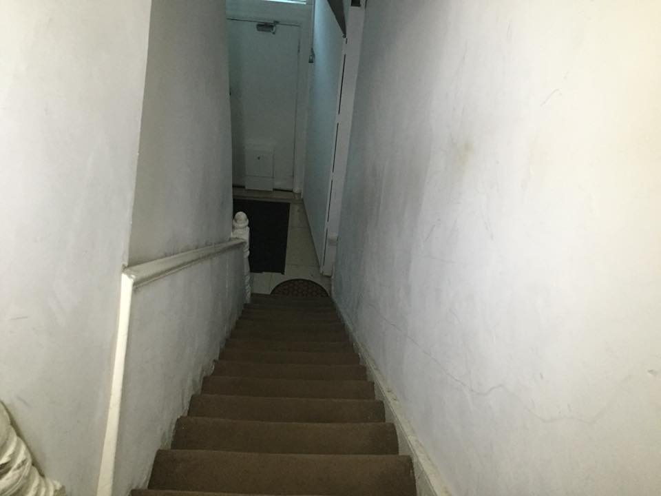 The steep & narrow staircase leading from Mr Sabriler's flat to the ground floor. Photo © Alp Ermiya