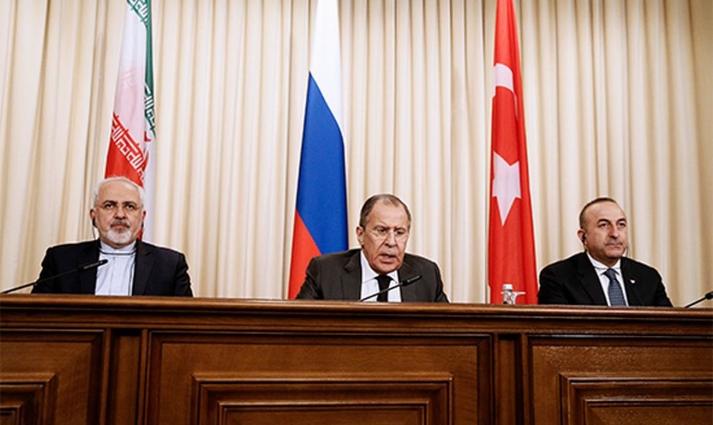MOSCOW, RUSSIA - DECEMBER 20, 2016: Iran's Foreign Minister Mohammad Javad Zarif, Russia's Foreign Minister Sergei Lavrov, and Turkey's Foreign Minister Mevlut Cavusoglu (L-R) give a joint news conference following their talks. Alexander Shcherbak/TASS